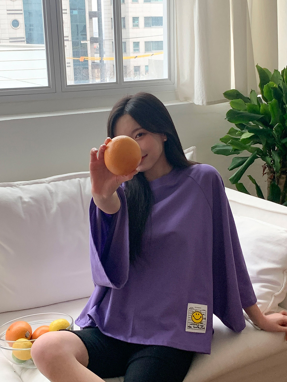 甜美笑臉寬袖上衣