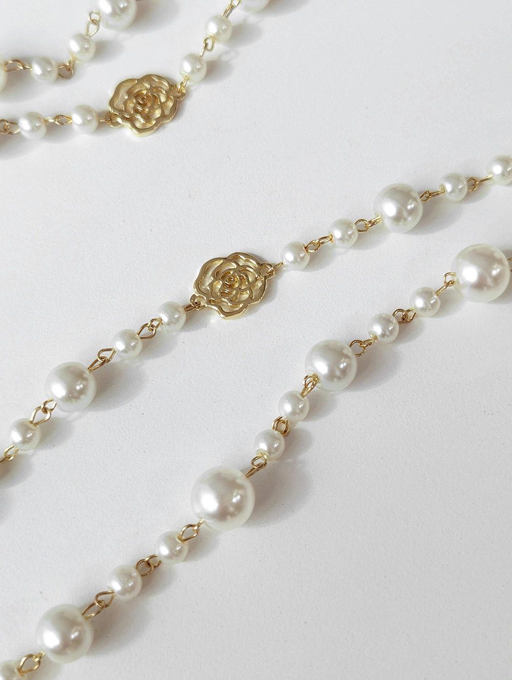 多層搭珍珠鏤空花朵長項鏈